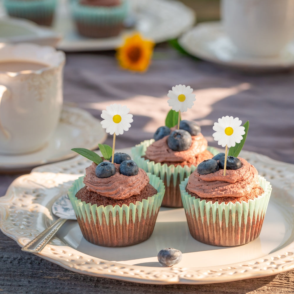 Muffins dekoraerade med Cake picks med motiv av Daisy/Prästkrageblomma  till midsommar, kalas och fest