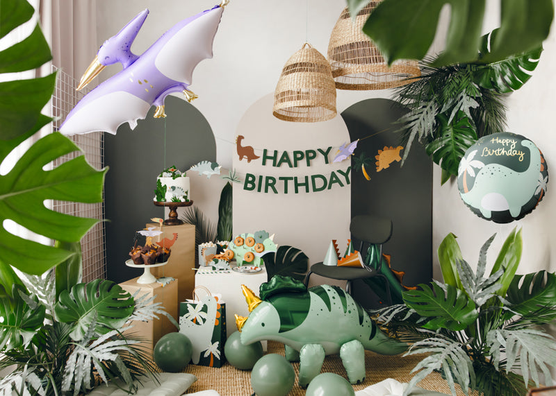 Folieballong med Brontosaurus motiv och texten Happy Birthday, dekorerad till barnkalas och födelsedag