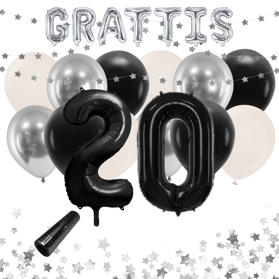 Festkit 20 år i svart och silver med ballonger och dekorationer.