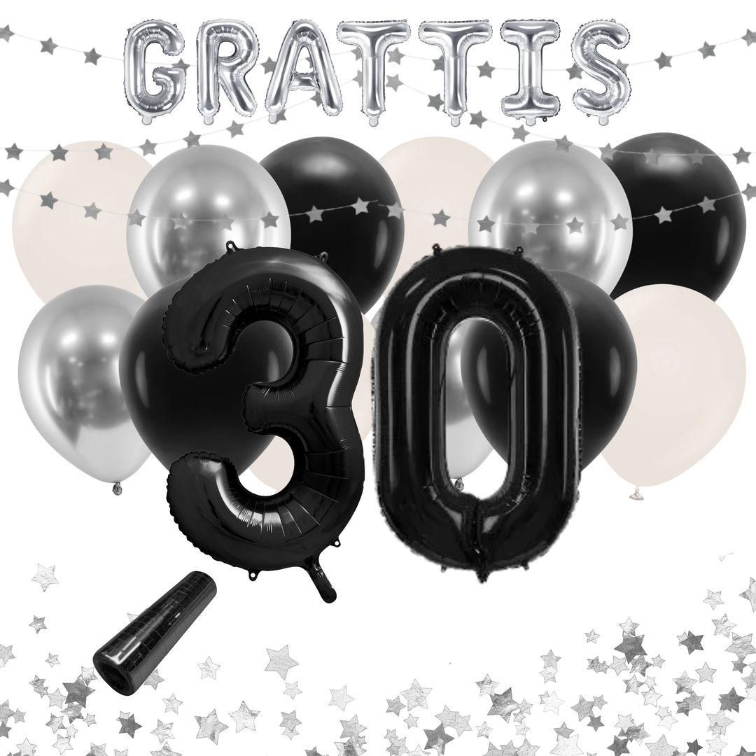 Festkit 30 år i svart och silver med ballonger och dekorationer.
